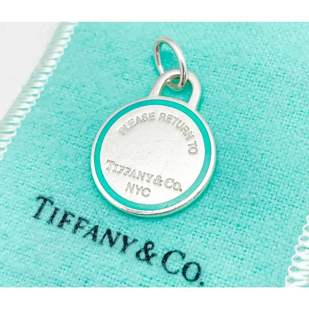 Tiffany & Co. Return to Tiffany Blue Enamel Border Round Charm Pendant Sterling